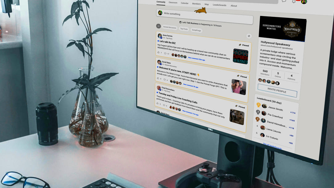 The Den member community open on a desktop monitor